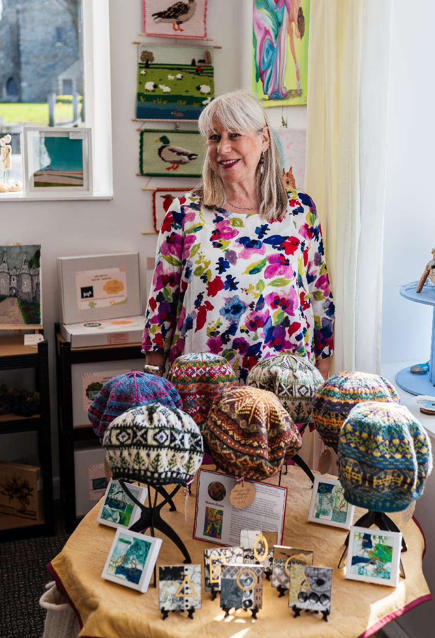 A creator with their creations